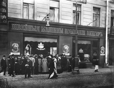 Crowds Drawn to a Demonstration in the Window of the Singer Sewing Machine Shop, St. Petersburg by Russian Photographer